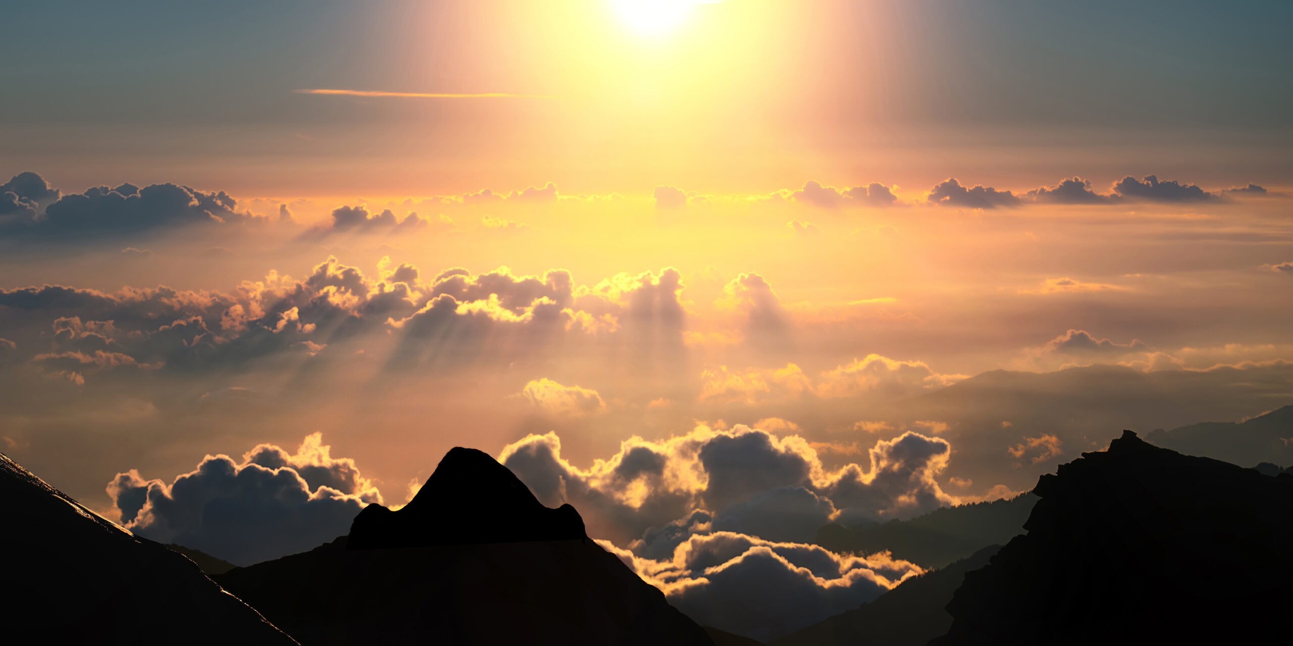 A breathtaking sunrise or sunset over a mountainous landscape